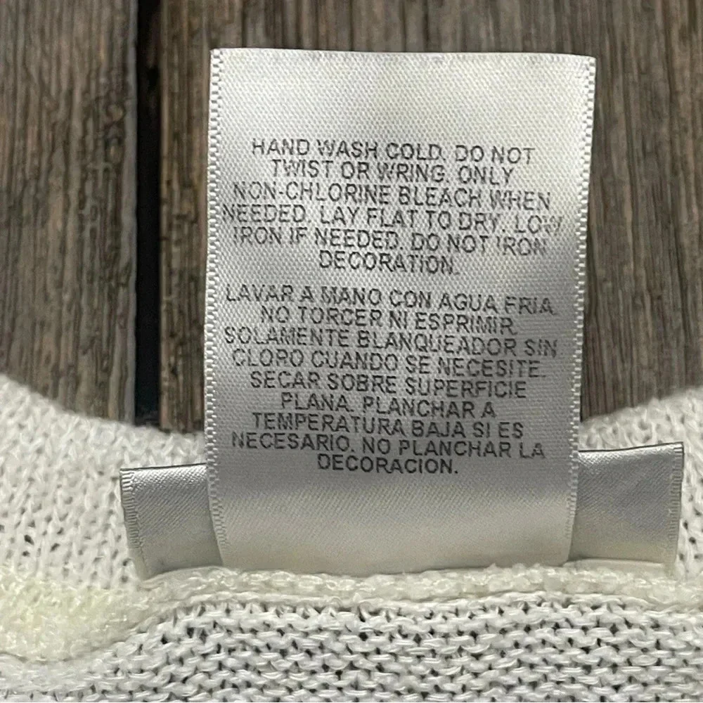 Disney Parks Minnie Bow women’s sweater. Size small. EUC. - Picture 5 of 8